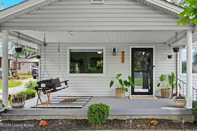 9712 Keys Ferry Rd, Fairdale, KY 40118 - back of house featuring a porch