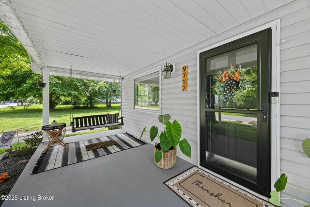 9712 Keys Ferry Rd, Fairdale, KY 40118 - view of exterior entry featuring covered porch