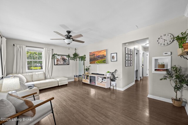 9712 Keys Ferry Rd, Fairdale, KY 40118 - living area featuring ceiling fan, wood finished floors, and baseboards