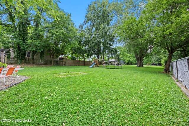 9712 Keys Ferry Rd, Fairdale, KY 40118 - view of yard with a playground