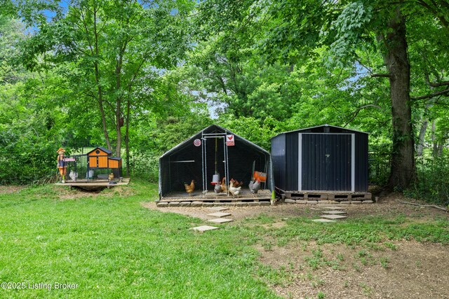 9712 Keys Ferry Rd, Fairdale, KY 40118 - view of grassy yard with exterior structure