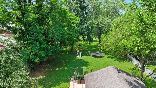 9712 Keys Ferry Rd, Fairdale, KY 40118 - view of yard featuring a trampoline