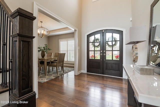 2004 Scenic Lakes Dr, Louisville, KY 40245 - entryway with french doors, a chandelier, dark wood finished floors, and baseboards