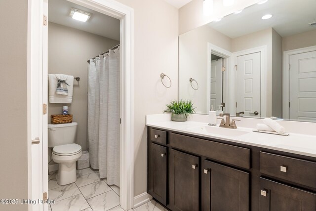 2004 Scenic Lakes Dr, Louisville, KY 40245 - full bath featuring marble finish flooring, toilet, vanity, and baseboards
