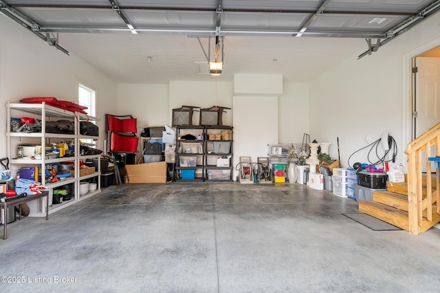 2004 Scenic Lakes Dr, Louisville, KY 40245 - garage featuring a garage door opener