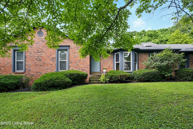 4303 Fence Pl, Louisville, KY 40241 - view of front of house with a front yard and brick siding