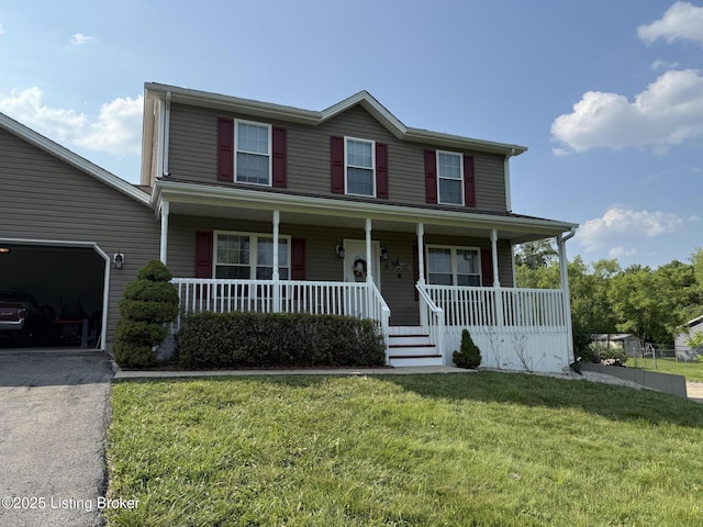 150 Infantry Ct, Vine Grove, KY 40175 - view of front of house featuring a porch, asphalt driveway, a front lawn, and an attached garage