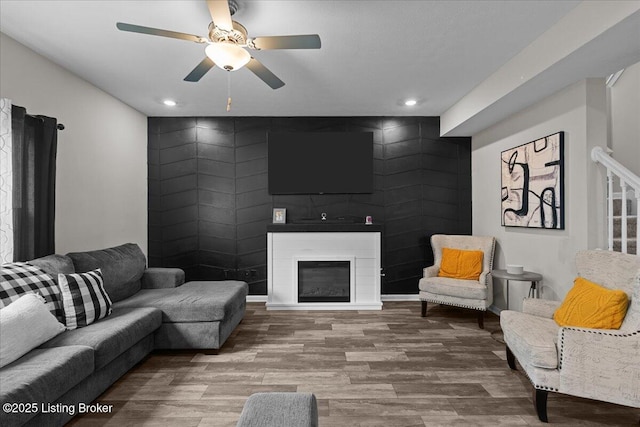 1105 Johnson Ridge Rd, Louisville, KY 40245 - living room with wood finished floors, a large fireplace, ceiling fan, and recessed lighting