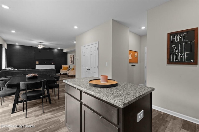 1105 Johnson Ridge Rd, Louisville, KY 40245 - kitchen with a ceiling fan, wood finished floors, a center island, recessed lighting, and open floor plan