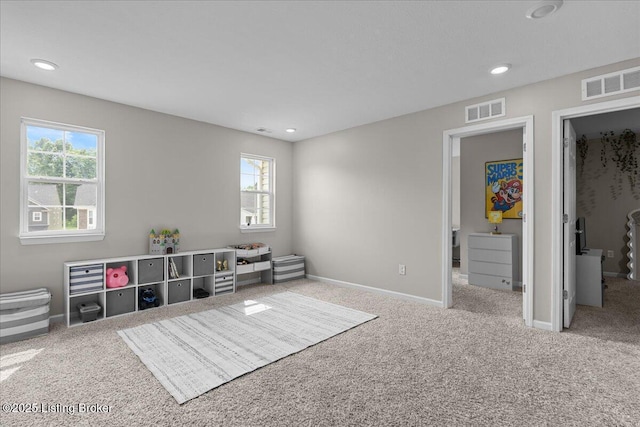 1105 Johnson Ridge Rd, Louisville, KY 40245 - bedroom featuring multiple windows, carpet flooring, a walk in closet, baseboards, and recessed lighting