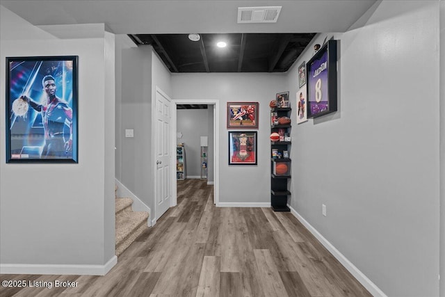 1105 Johnson Ridge Rd, Louisville, KY 40245 - hall featuring wood finished floors, baseboards, and stairway