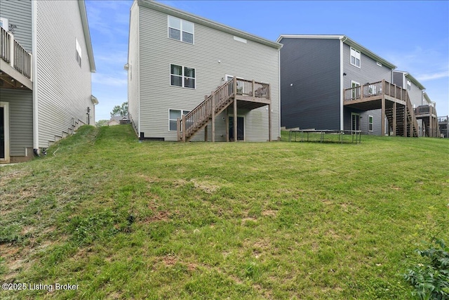 1105 Johnson Ridge Rd, Louisville, KY 40245 - rear view of house with stairway, a wooden deck, and a yard