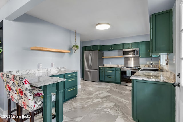 7007 Graymoor Rd, Louisville, KY 40222 - kitchen with appliances with stainless steel finishes, open shelves, green cabinets, a sink, and light stone countertops
