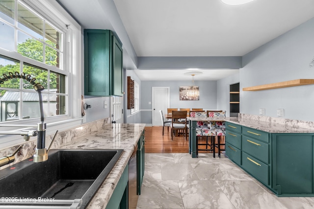 7007 Graymoor Rd, Louisville, KY 40222 - kitchen with green cabinets, healthy amount of natural light, a sink, and light stone counters