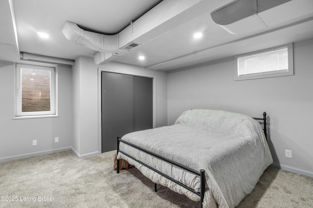 7007 Graymoor Rd, Louisville, KY 40222 - carpeted bedroom featuring baseboards, recessed lighting, a closet, and multiple windows