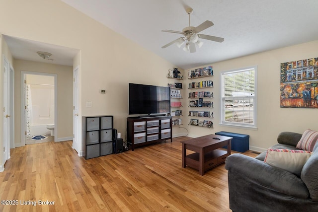 1421 W Elm Rd, Radcliff, KY 40160 - living area featuring ceiling fan, light wood-type flooring, vaulted ceiling, and baseboards
