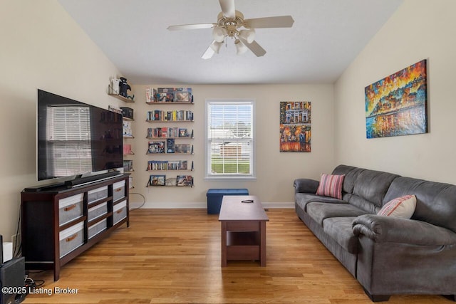 1421 W Elm Rd, Radcliff, KY 40160 - living area featuring light wood-type flooring, ceiling fan, and baseboards