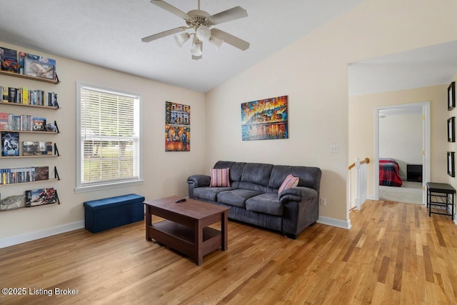 1421 W Elm Rd, Radcliff, KY 40160 - living area with light wood-style floors, ceiling fan, lofted ceiling, and baseboards