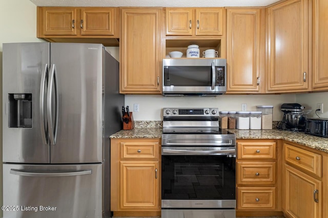 1421 W Elm Rd, Radcliff, KY 40160 - kitchen with stainless steel appliances, light stone countertops, and open shelves
