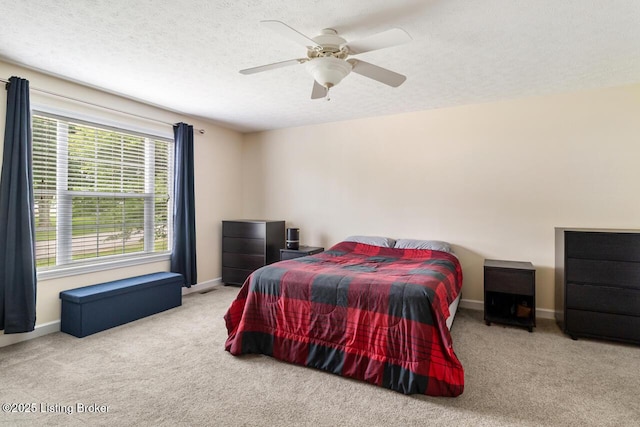 1421 W Elm Rd, Radcliff, KY 40160 - bedroom with carpet floors, baseboards, ceiling fan, and a textured ceiling
