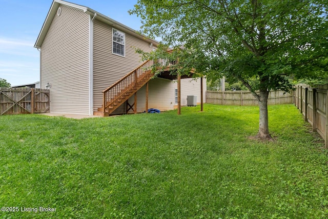 1421 W Elm Rd, Radcliff, KY 40160 - back of property with stairs, a deck, and central air condition unit