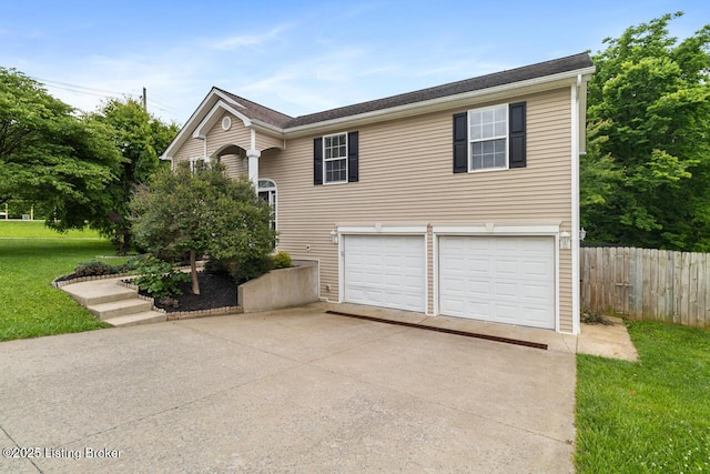 1421 W Elm Rd, Radcliff, KY 40160 - view of front of house with concrete driveway and an attached garage