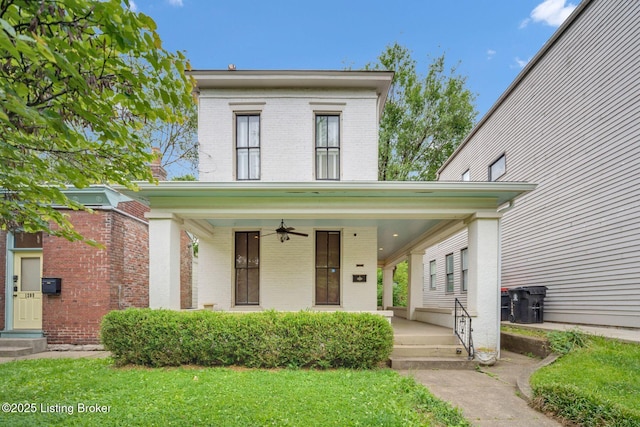 1211 S 6th St, Louisville, KY 40203 - view of front of home featuring brick siding, a porch, ceiling fan, and a front lawn