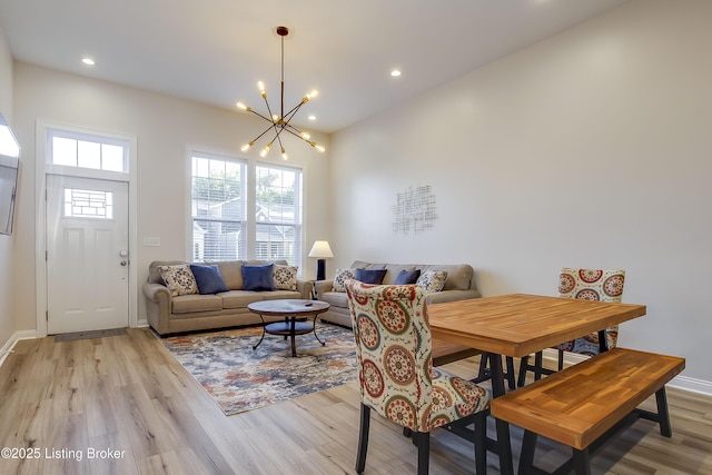 421 Marret Ave, Louisville, KY 40208 - dining space featuring a chandelier, light wood-style flooring, baseboards, and recessed lighting