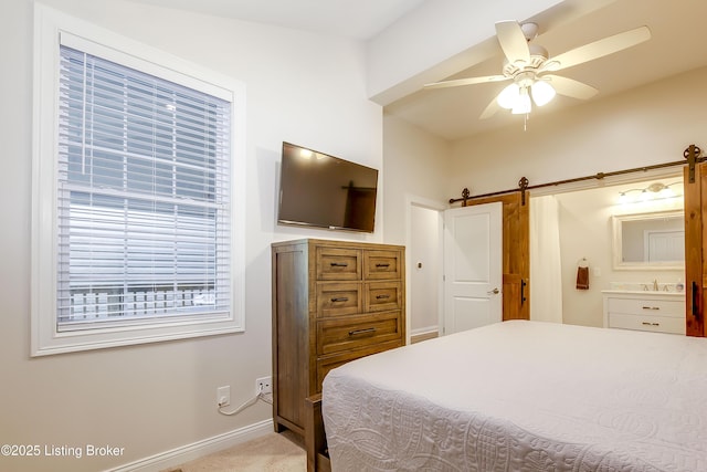 421 Marret Ave, Louisville, KY 40208 - carpeted bedroom with a barn door, baseboards, and ceiling fan