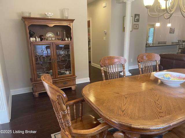 6008 Cottage Ln, Crestwood, KY 40014 - dining space with dark wood-style flooring, baseboards, and a chandelier