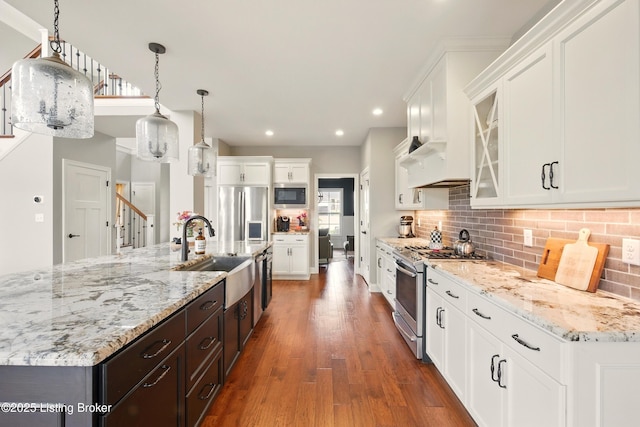 7811 Ingram Way, Crestwood, KY 40014 - kitchen with appliances with stainless steel finishes, a sink, recessed lighting, dark wood finished floors, and white cabinets