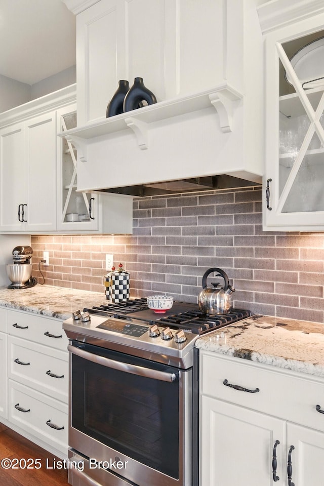 7811 Ingram Way, Crestwood, KY 40014 - kitchen featuring stainless steel gas stove, white cabinets, backsplash, and glass insert cabinets
