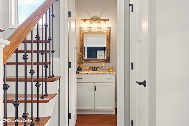 7811 Ingram Way, Crestwood, KY 40014 - corridor with wood finished floors, stairway, and a sink