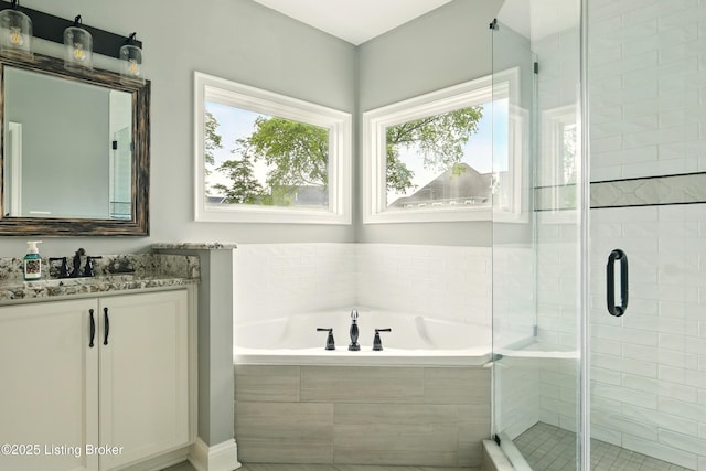 7811 Ingram Way, Crestwood, KY 40014 - full bathroom featuring vanity, a garden tub, and a stall shower