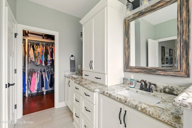 7811 Ingram Way, Crestwood, KY 40014 - bathroom featuring double vanity and a walk in closet