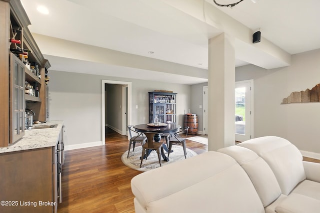 7811 Ingram Way, Crestwood, KY 40014 - living area featuring bar with sink, dark wood-style flooring, baseboards, and recessed lighting