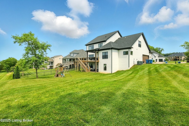 7811 Ingram Way, Crestwood, KY 40014 - back of house with a playground, a wooden deck, cooling unit, stairway, and a shingled roof