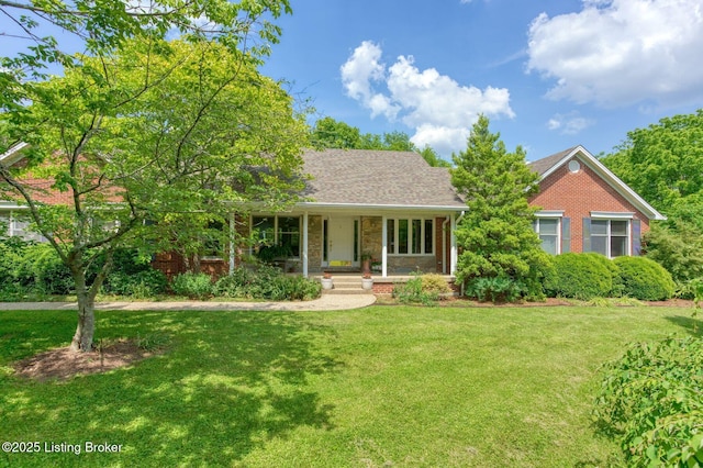 6311 Fible Ln, Crestwood, KY 40014 - view of front of home with covered porch, a front yard, and brick siding