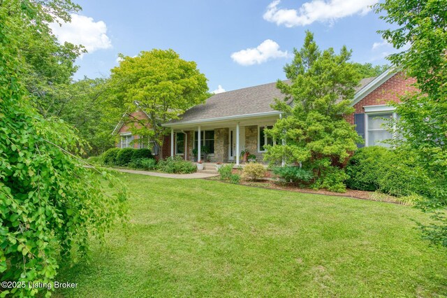 6311 Fible Ln, Crestwood, KY 40014 - view of front facade with a porch, a front yard, and stone siding