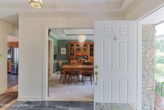 6311 Fible Ln, Crestwood, KY 40014 - carpeted dining area featuring crown molding, a raised ceiling, and baseboards