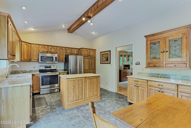 6311 Fible Ln, Crestwood, KY 40014 - kitchen with appliances with stainless steel finishes, a sink, a center island, tasteful backsplash, and glass insert cabinets