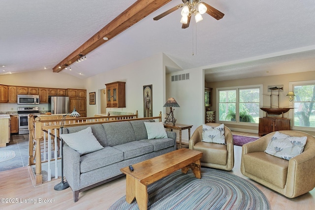 6311 Fible Ln, Crestwood, KY 40014 - living area with a ceiling fan, a textured ceiling, and light wood finished floors