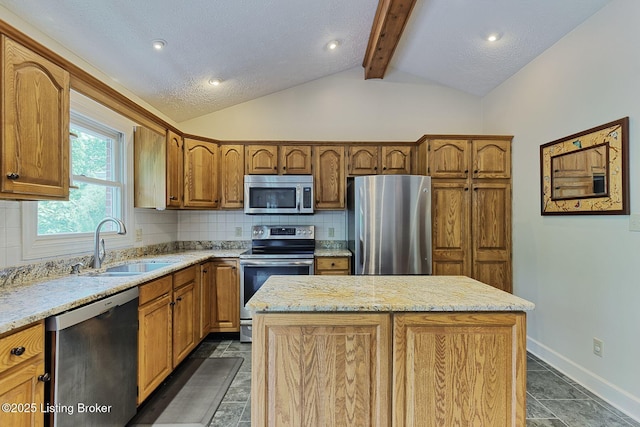 6311 Fible Ln, Crestwood, KY 40014 - kitchen with stainless steel appliances, a sink, a center island, decorative backsplash, and brown cabinetry