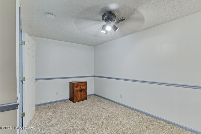 6311 Fible Ln, Crestwood, KY 40014 - carpeted spare room featuring ceiling fan, a textured ceiling, baseboards, and a smoke detector