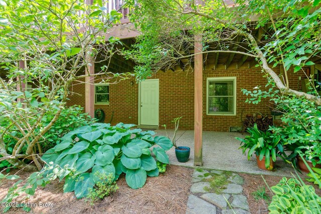 6311 Fible Ln, Crestwood, KY 40014 - entrance to property with brick siding and a patio