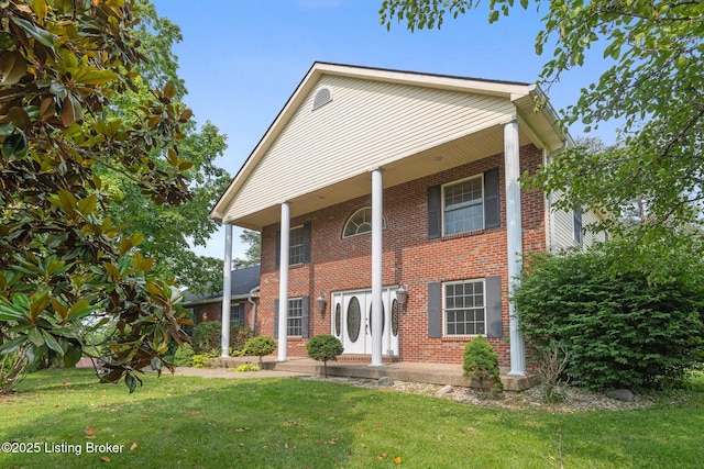 622 Hillcreek Dr, Elizabethtown, KY 42701 - neoclassical / greek revival house with brick siding and a front lawn