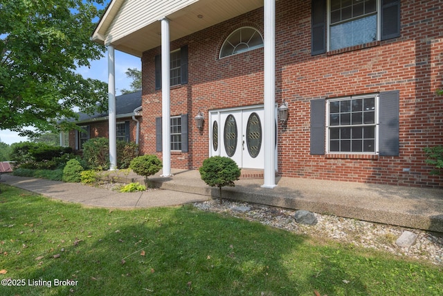 622 Hillcreek Dr, Elizabethtown, KY 42701 - doorway to property with brick siding and covered porch