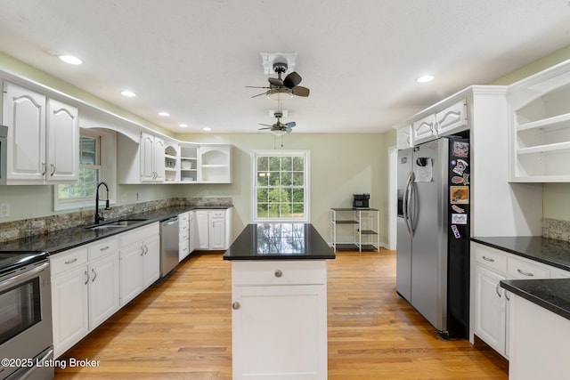622 Hillcreek Dr, Elizabethtown, KY 42701 - kitchen with stainless steel appliances, a sink, a kitchen island, white cabinets, and recessed lighting