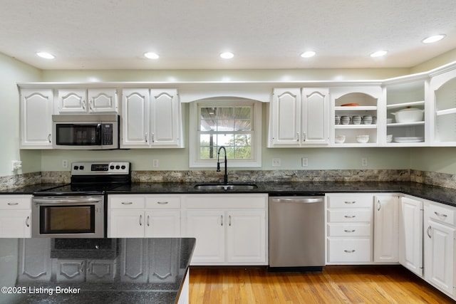 622 Hillcreek Dr, Elizabethtown, KY 42701 - kitchen featuring stainless steel appliances, a sink, white cabinetry, light wood finished floors, and recessed lighting