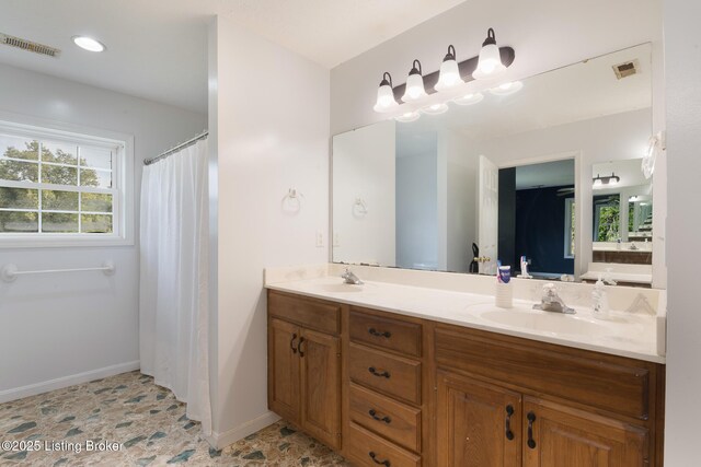 622 Hillcreek Dr, Elizabethtown, KY 42701 - full bath with double vanity and baseboards